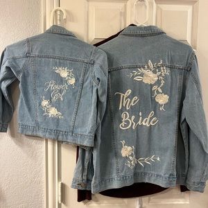 Women’s size large 
Little girls size 5-6
David’s bridal Jean jackets.